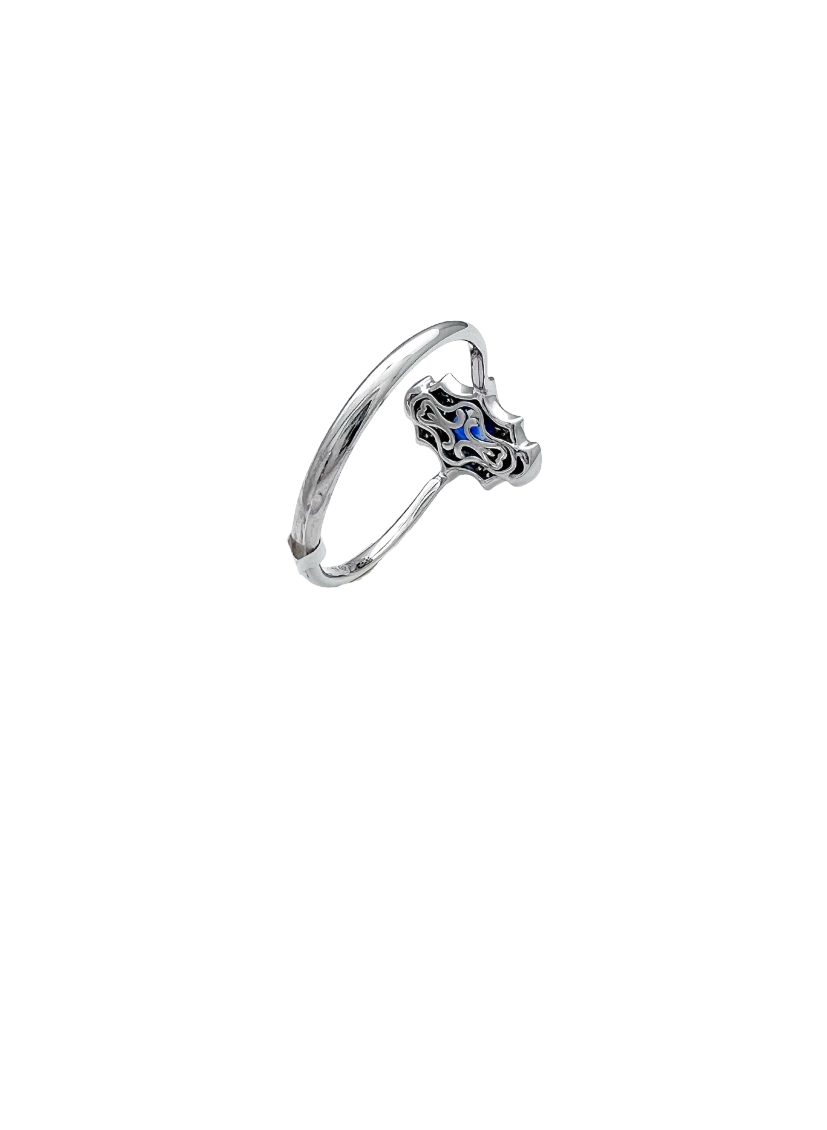0.11 Carats Diamond VS2 & 0.57 Carats Blue Sapphire Set In 14 Karat White Gold Ring