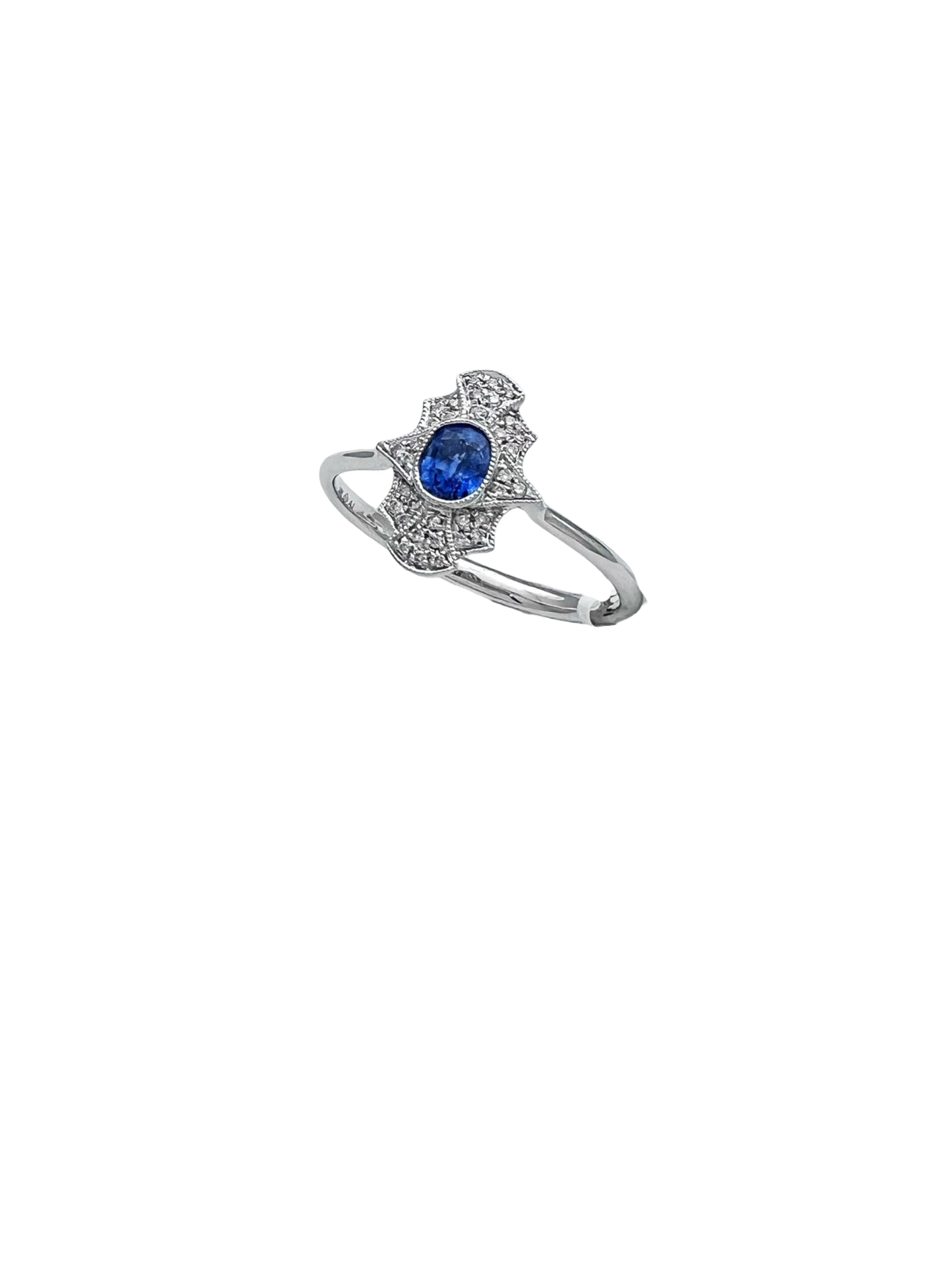 0.11 Carats Diamond VS2 & 0.57 Carats Blue Sapphire Set In 14 Karat White Gold Ring