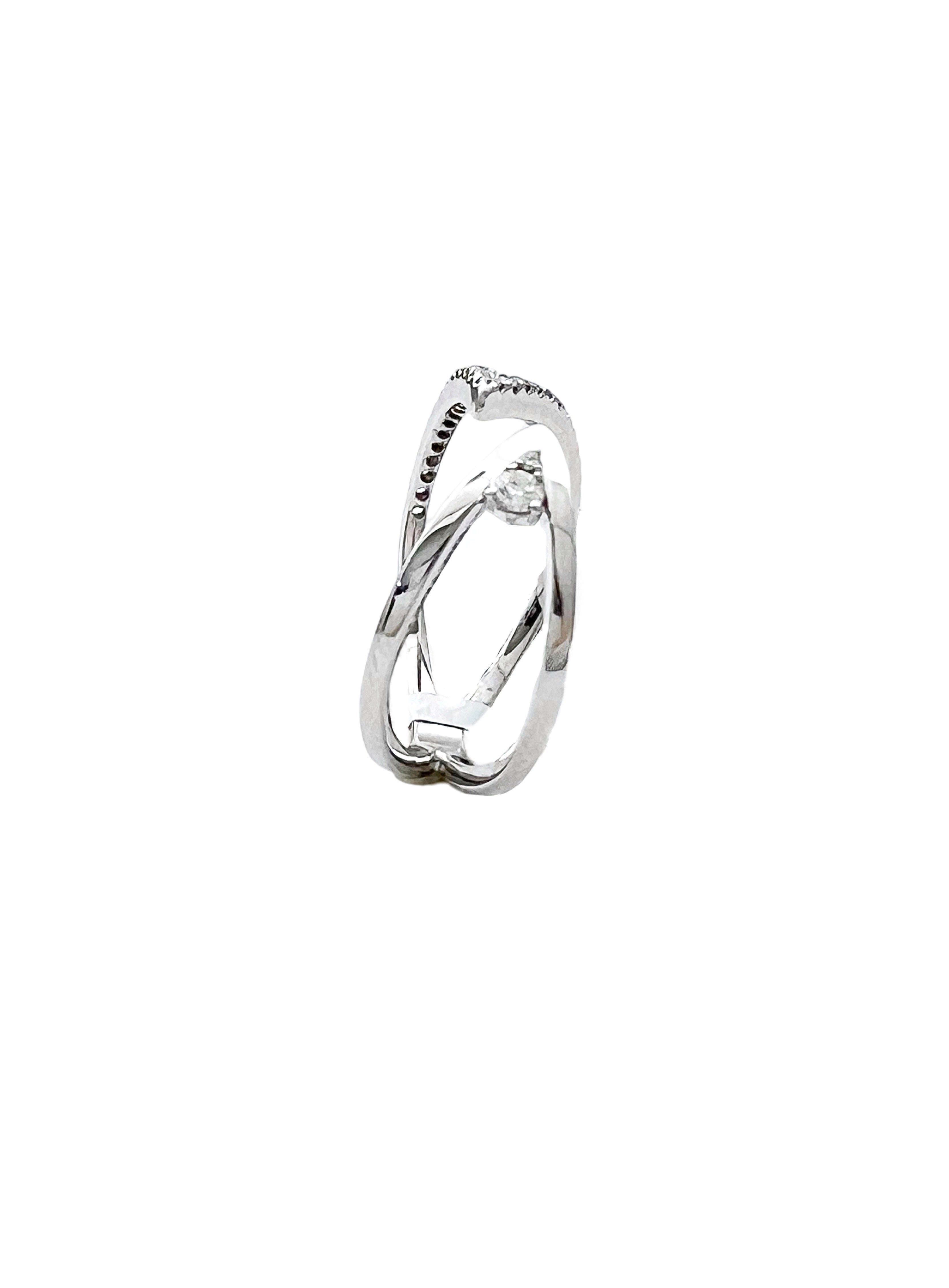 0.25 Carats Diamonds VS2 Set In 14 Karat White Gold Bi-Pass Ring
