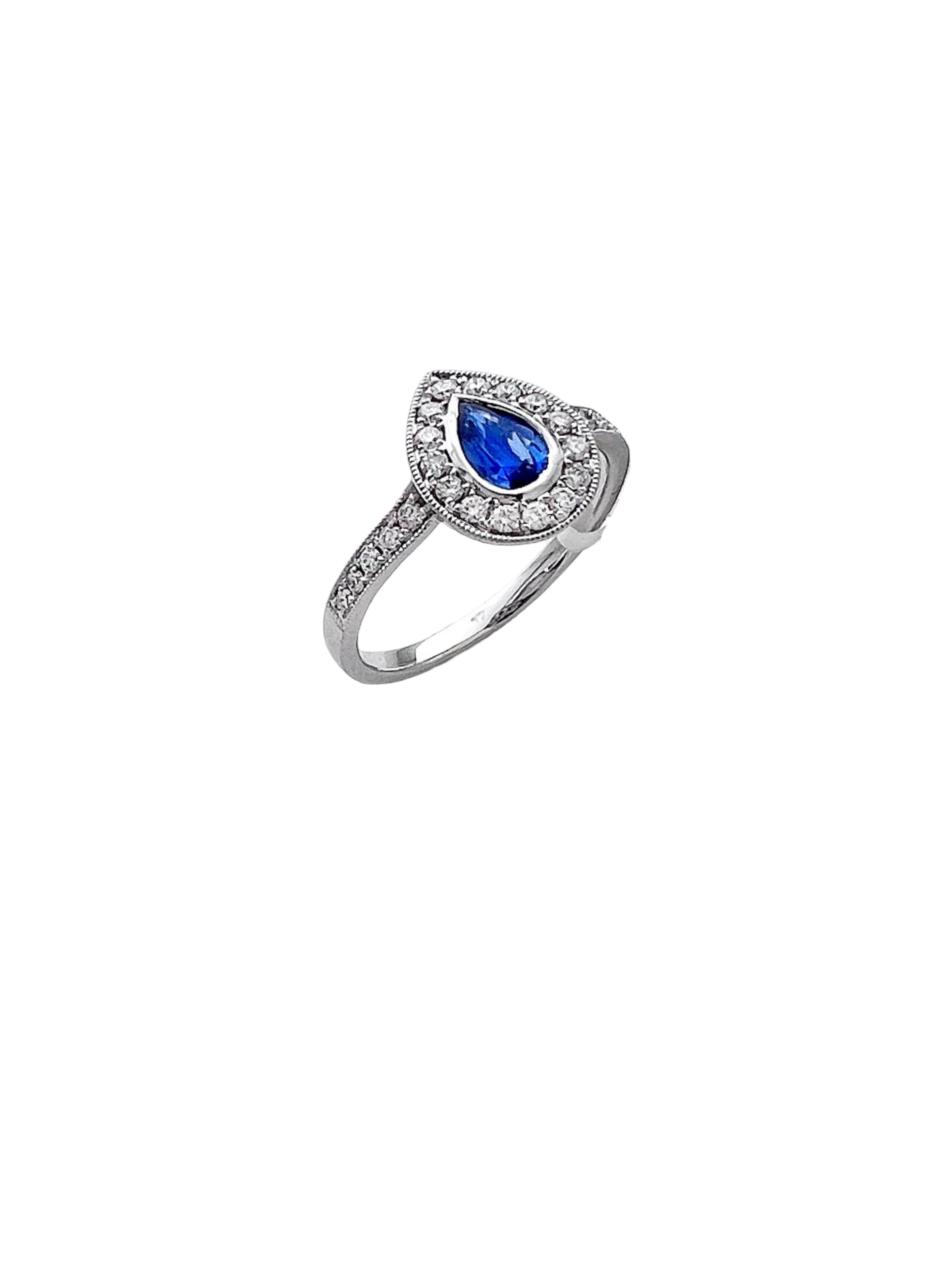 0.28 Carats Diamond VS2 & 0.44 Carats Blue Sapphire Set In 14 Karat White Gold Ring