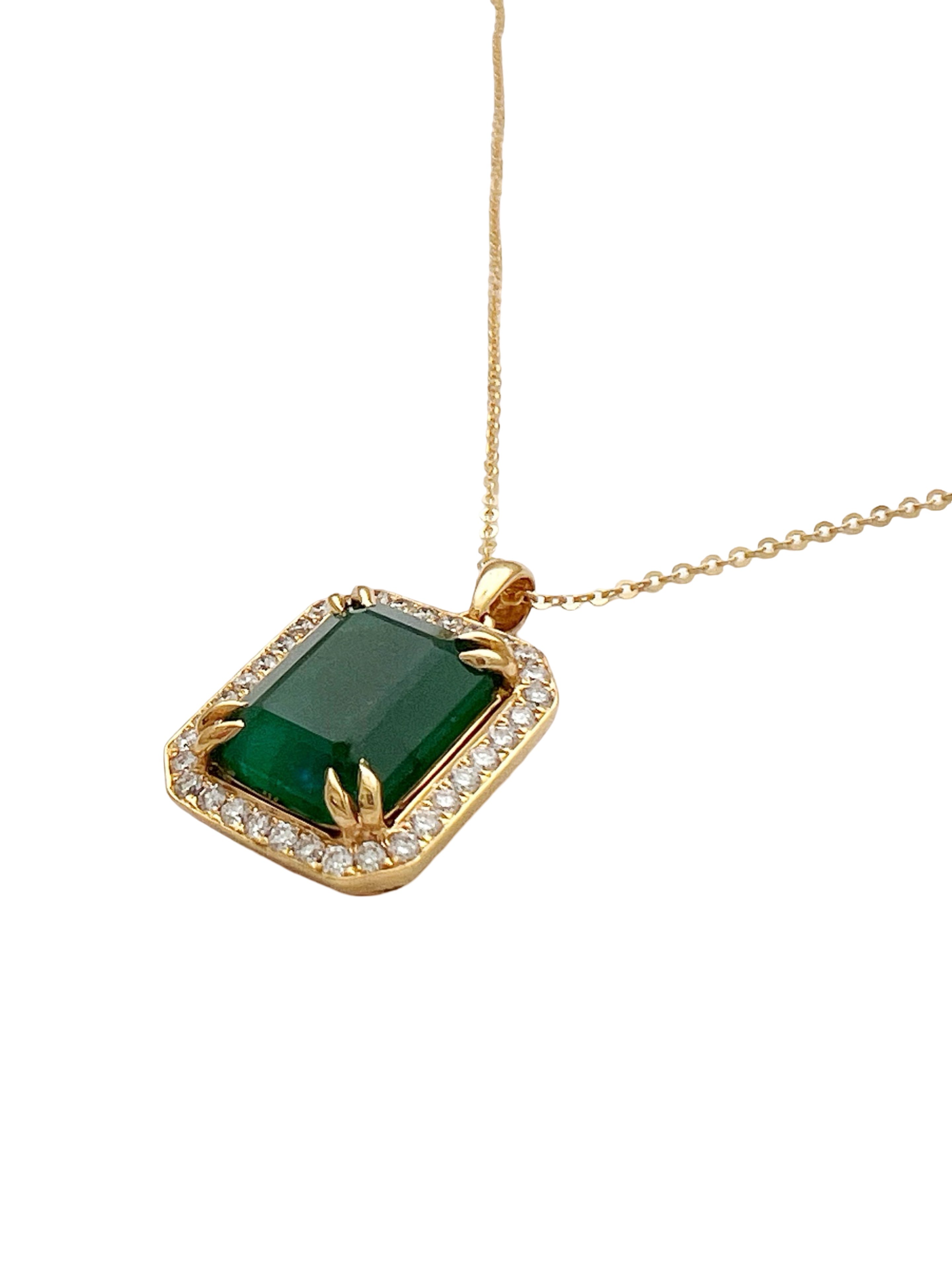 7.08 Carats Brazilian Emerald No-Oil (Certified) & 0.56 Carats Diamonds VS2 (34 melees) 3.6 Grams Set In 14 Karat Yellow Gold Pendant Includes 14 Karat Chain 18 Inches