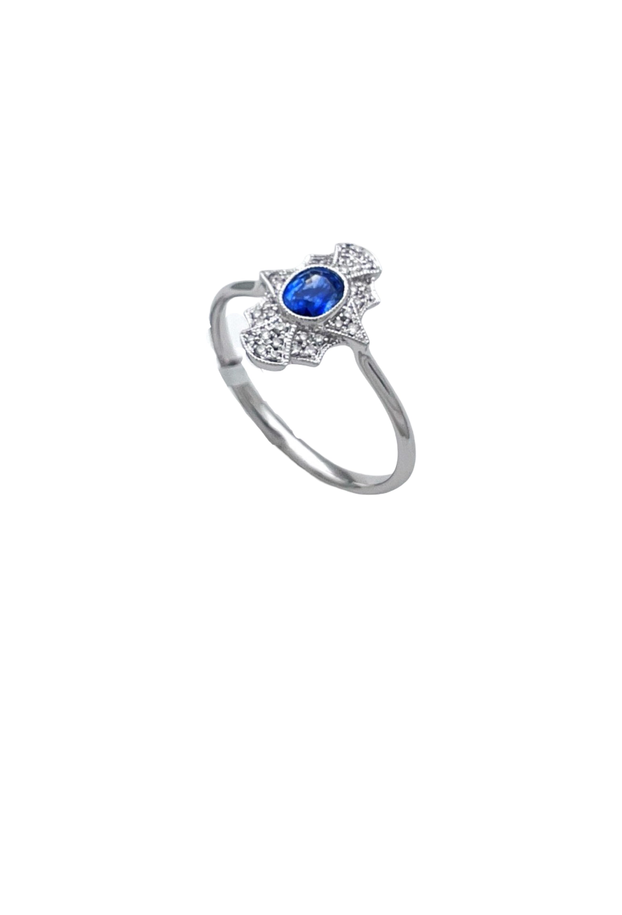 0.11 Carats Diamond VS2 & 0.57 Carats Blue Sapphire Set In 14 Karat White Gold Ring