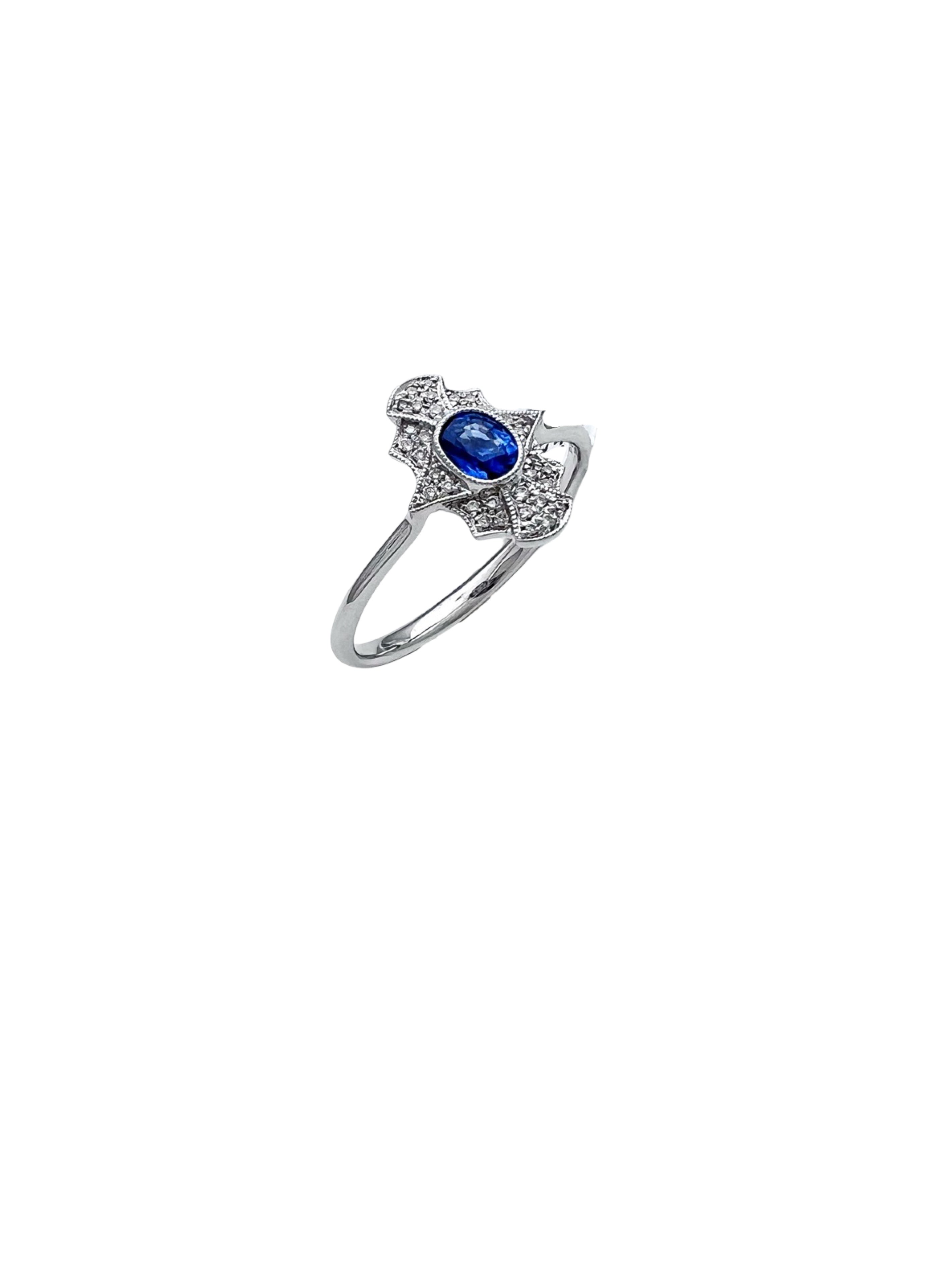 0.11 Carats Diamond VS2 & 0.57 Carats Blue Sapphire Set In 14 Karat White Gold Ring