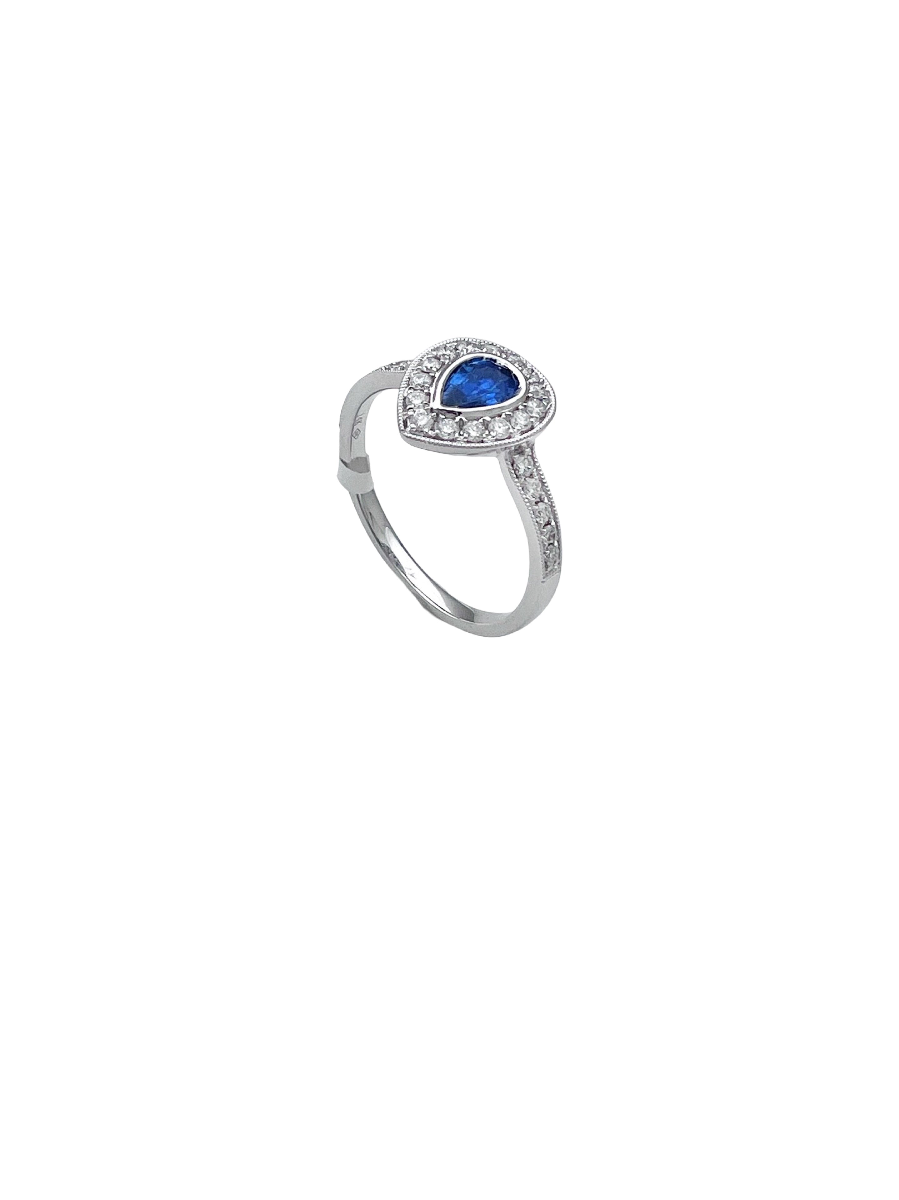0.28 Carats Diamond VS2 & 0.44 Carats Blue Sapphire Set In 14 Karat White Gold Ring