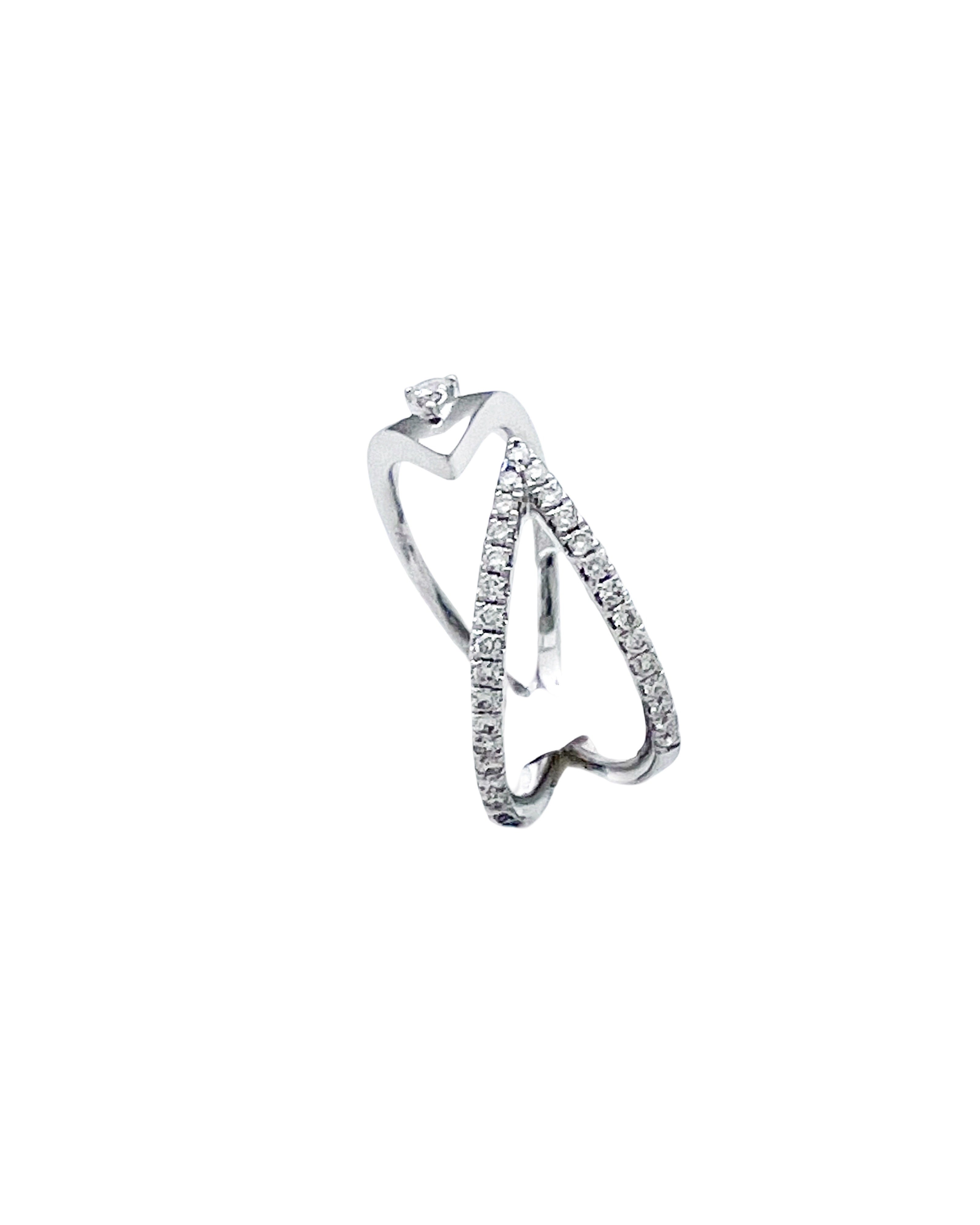 0.25 Carats Diamonds VS2 Set In 14 Karat White Gold Bi-Pass Ring
