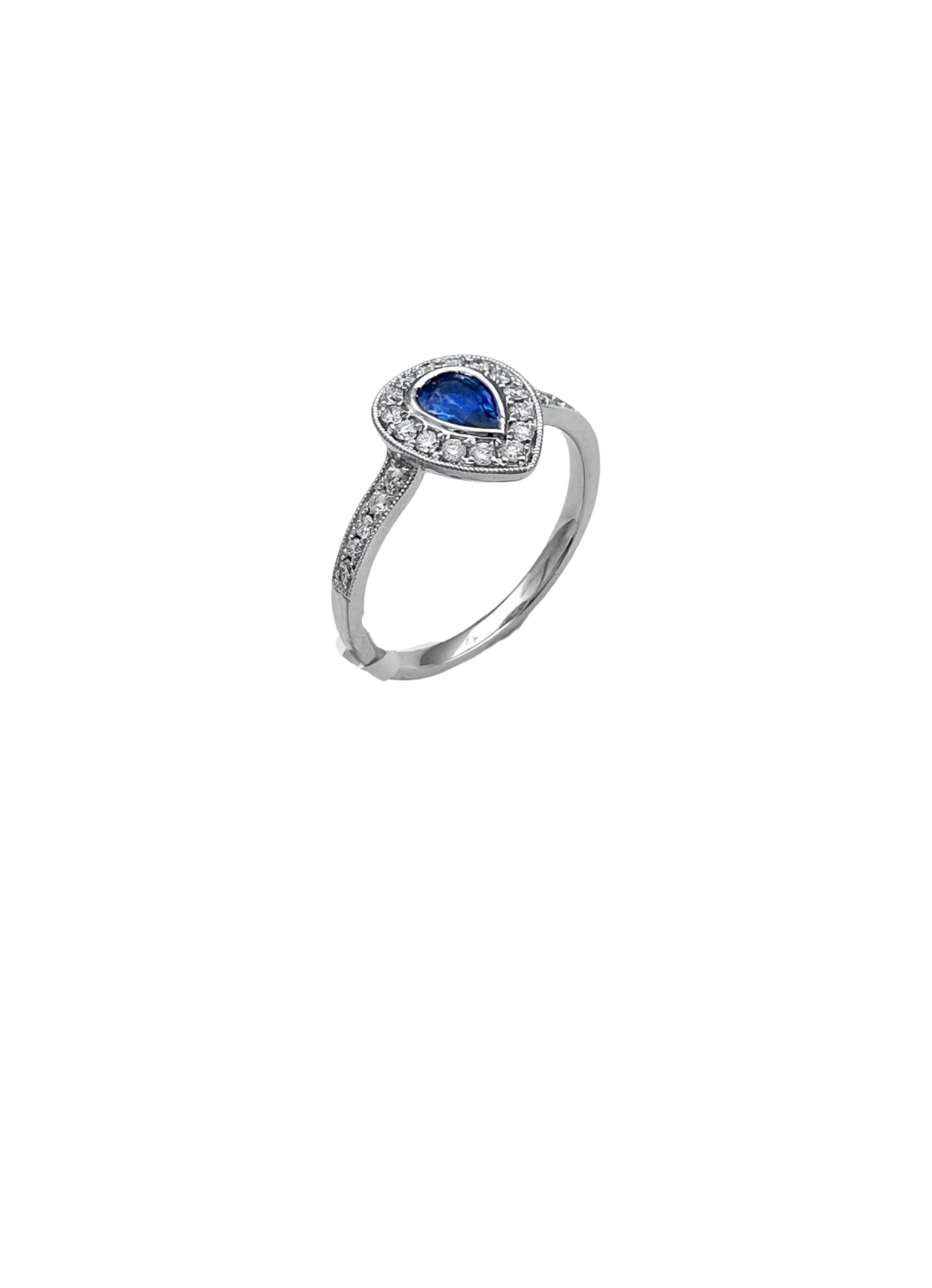 0.28 Carats Diamond VS2 & 0.44 Carats Blue Sapphire Set In 14 Karat White Gold Ring