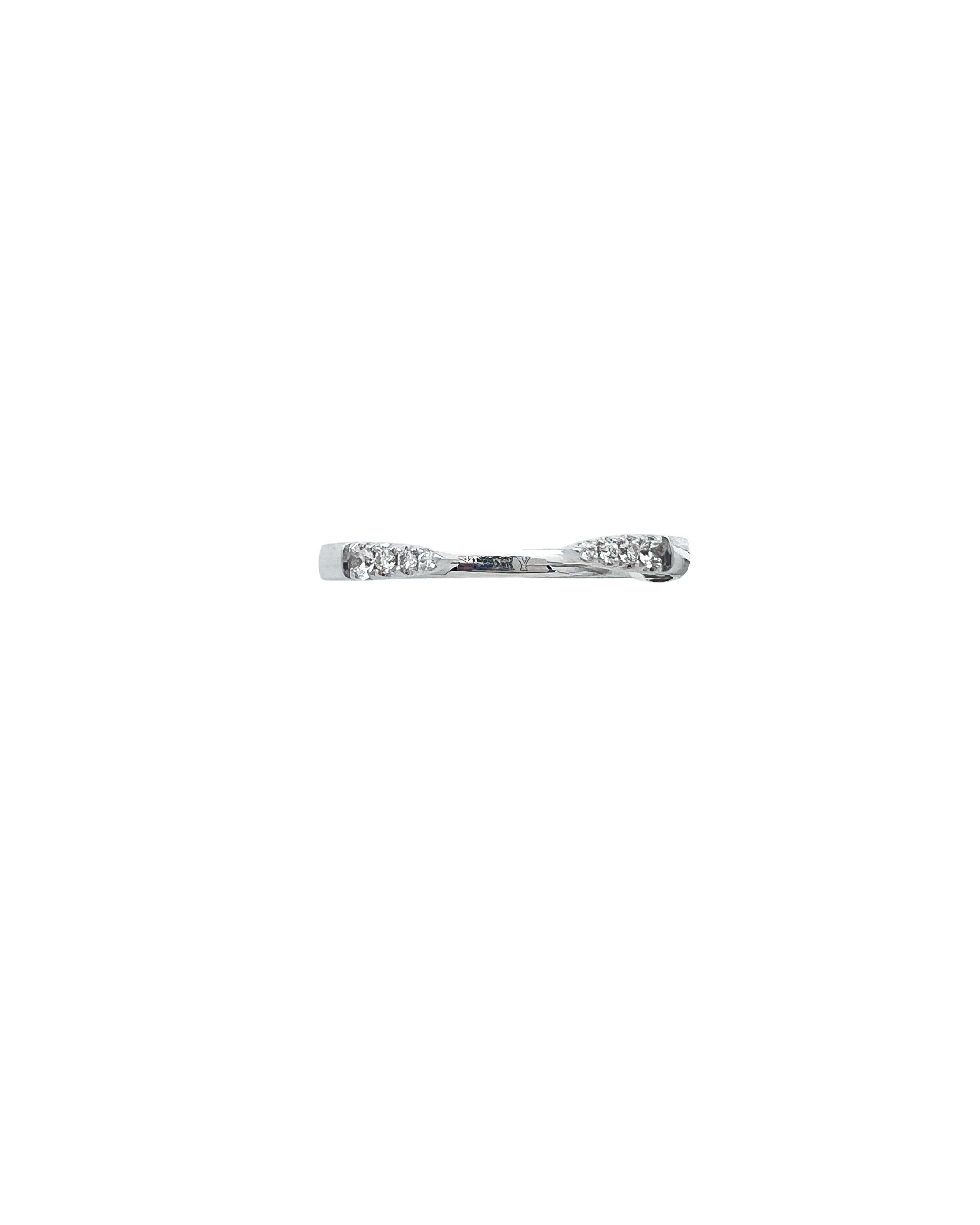 0.07 Carats Diamond VS2 Set In 14 Karat White Gold Gap Band