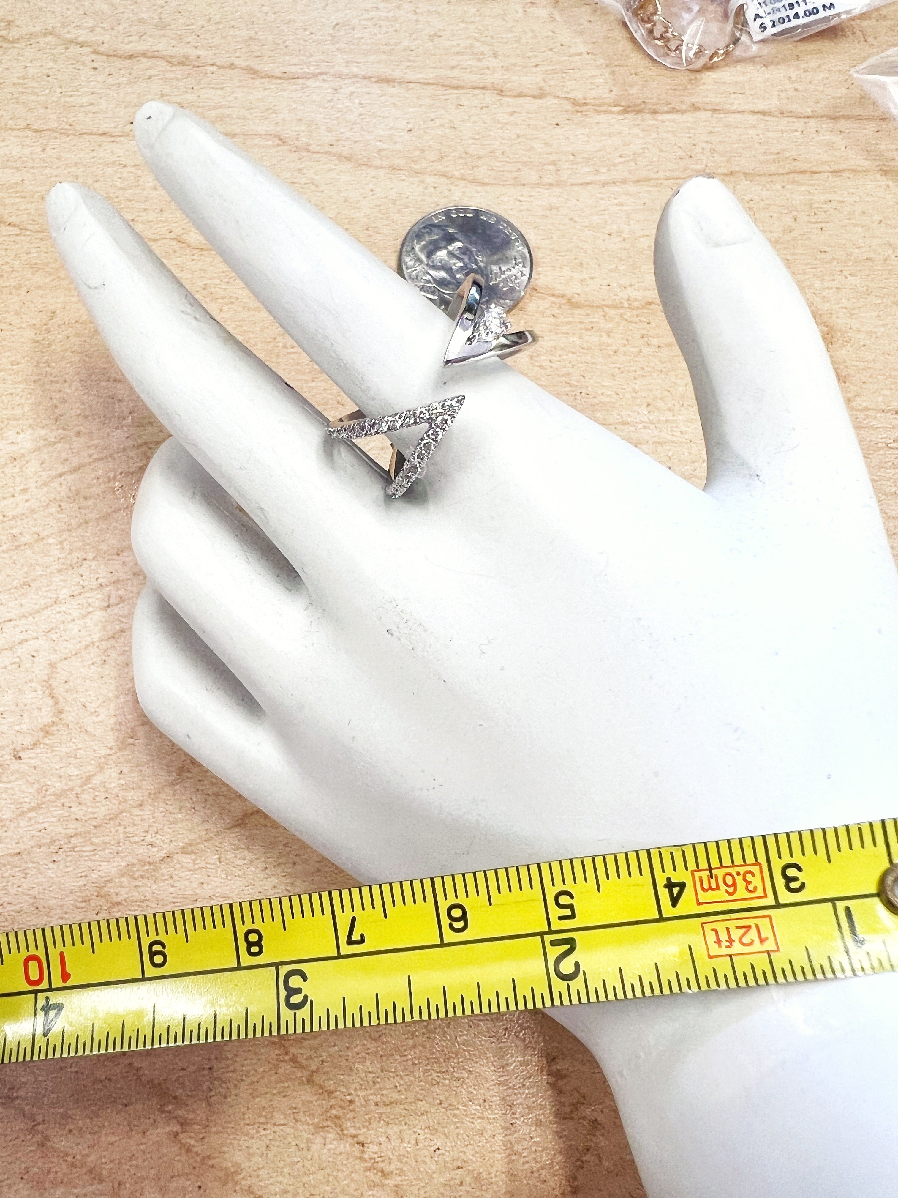 0.25 Carats Diamonds VS2 Set In 14 Karat White Gold Bi-Pass Ring