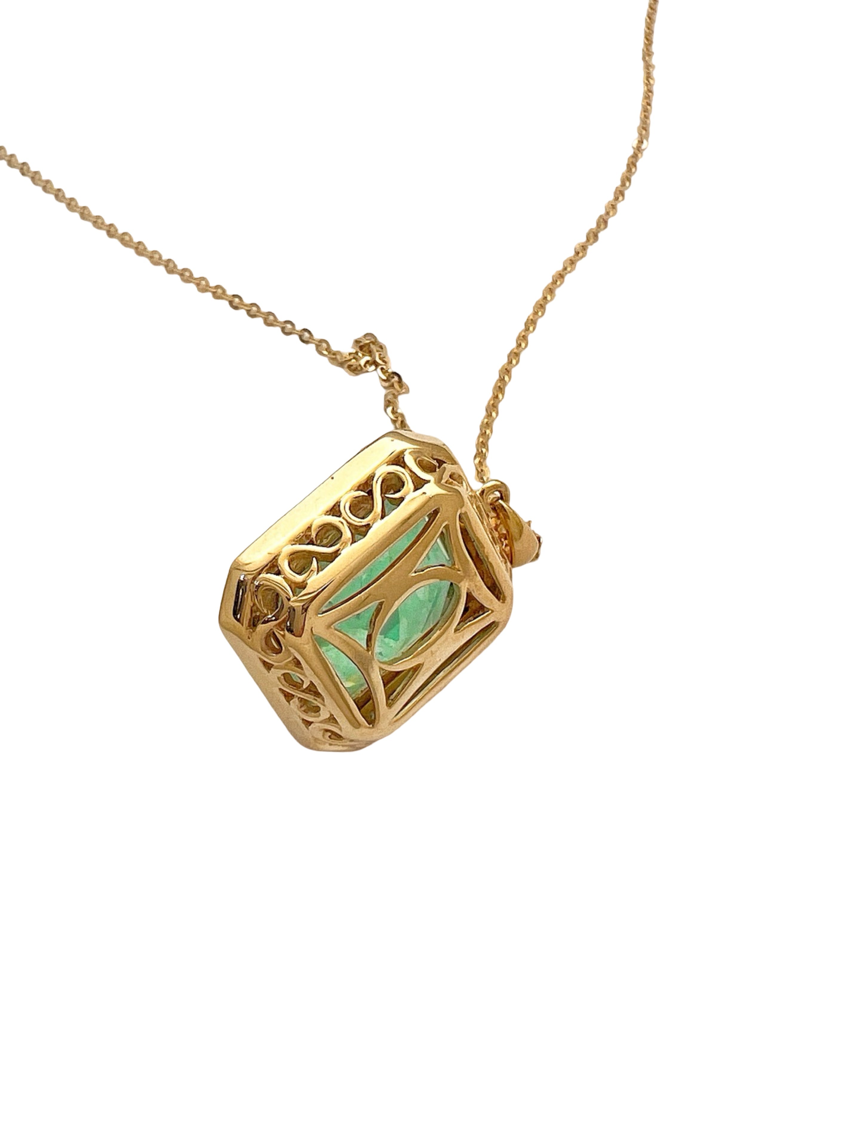 8.95 Carats Colombian Emerald F1 GIA (Certified) & 0.55 Carats Diamonds Set In 14 Karat Yellow Gold. Includes 14 Karat Dia-Cut Chain 18” Adjustable 16”