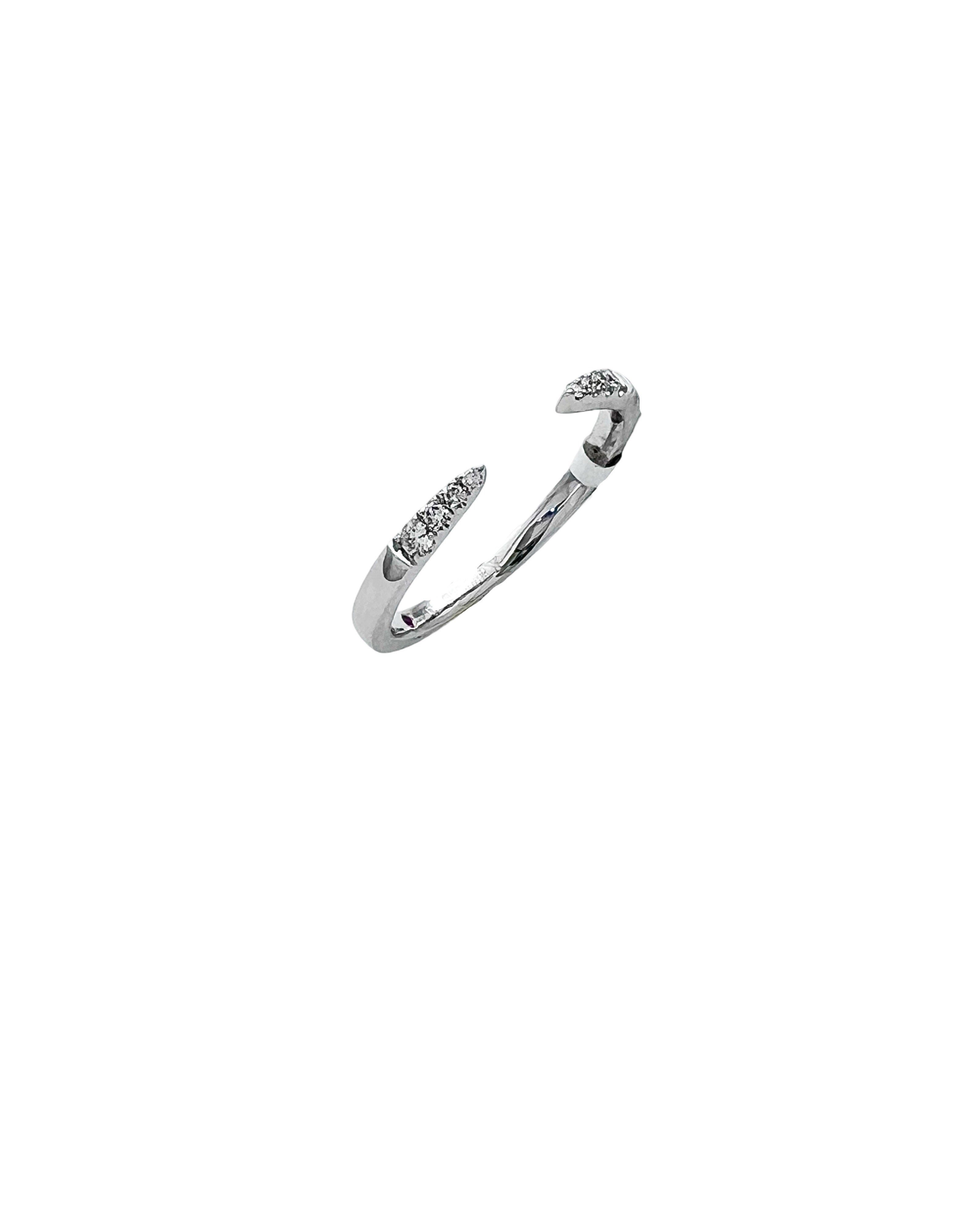 0.07 Carats Diamond VS2 Set In 14 Karat White Gold Gap Band