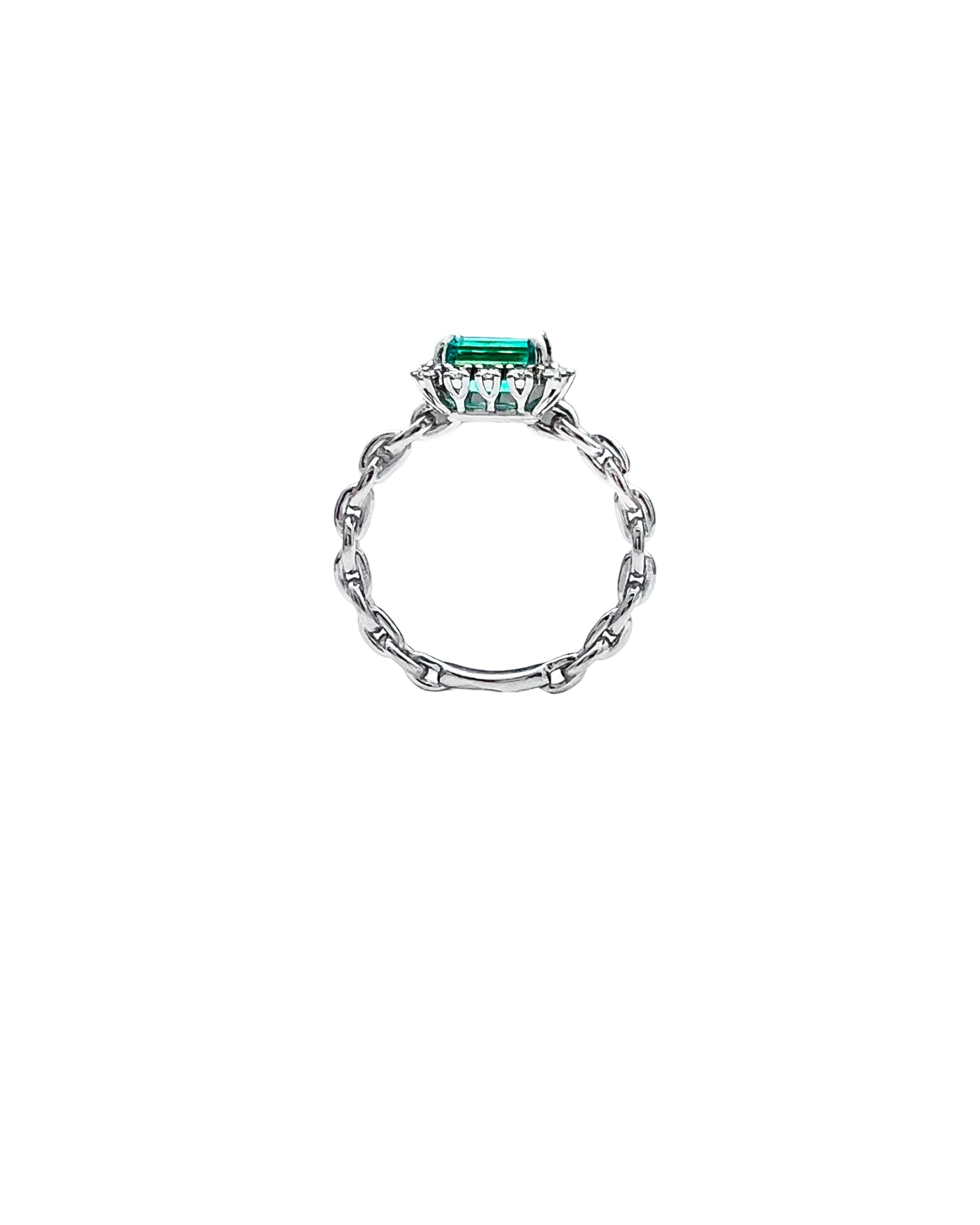 0.77 Carats Colombian Emerald F1 And 0.24 Carats Diamond VS2 Set 14 Karat White Gold Ring