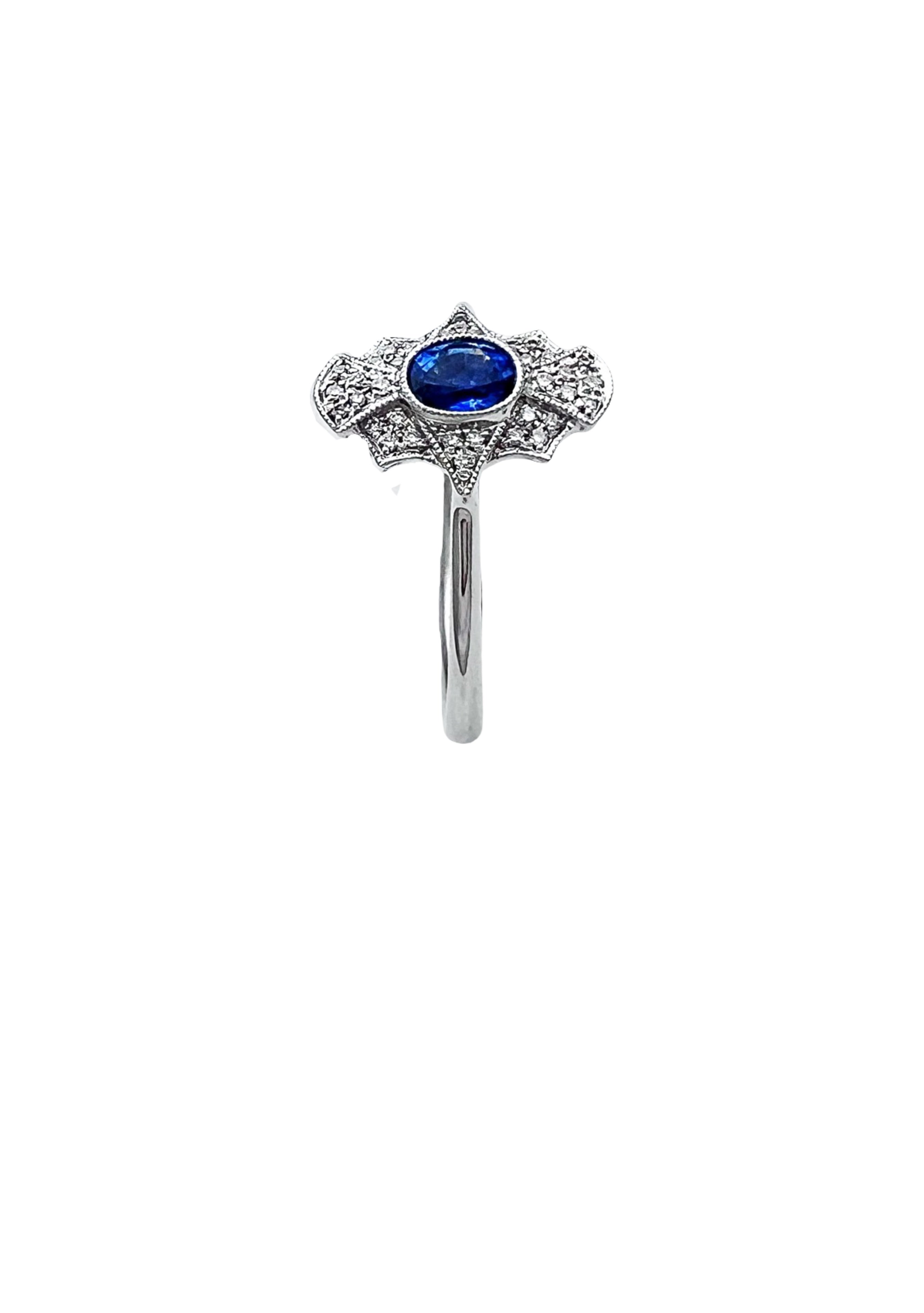 0.11 Carats Diamond VS2 & 0.57 Carats Blue Sapphire Set In 14 Karat White Gold Ring