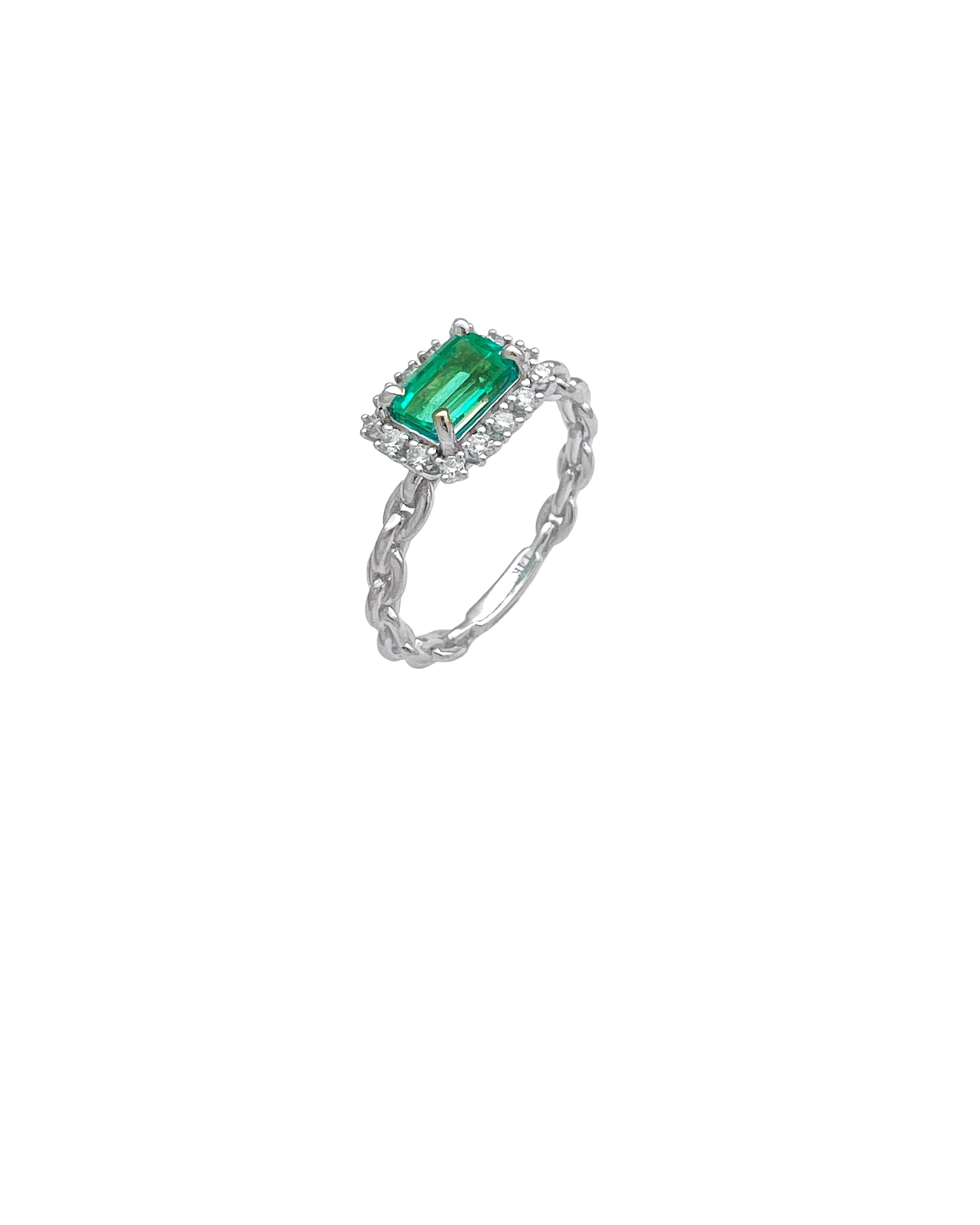 0.77 Carats Colombian Emerald F1 And 0.24 Carats Diamond VS2 Set 14 Karat White Gold Ring