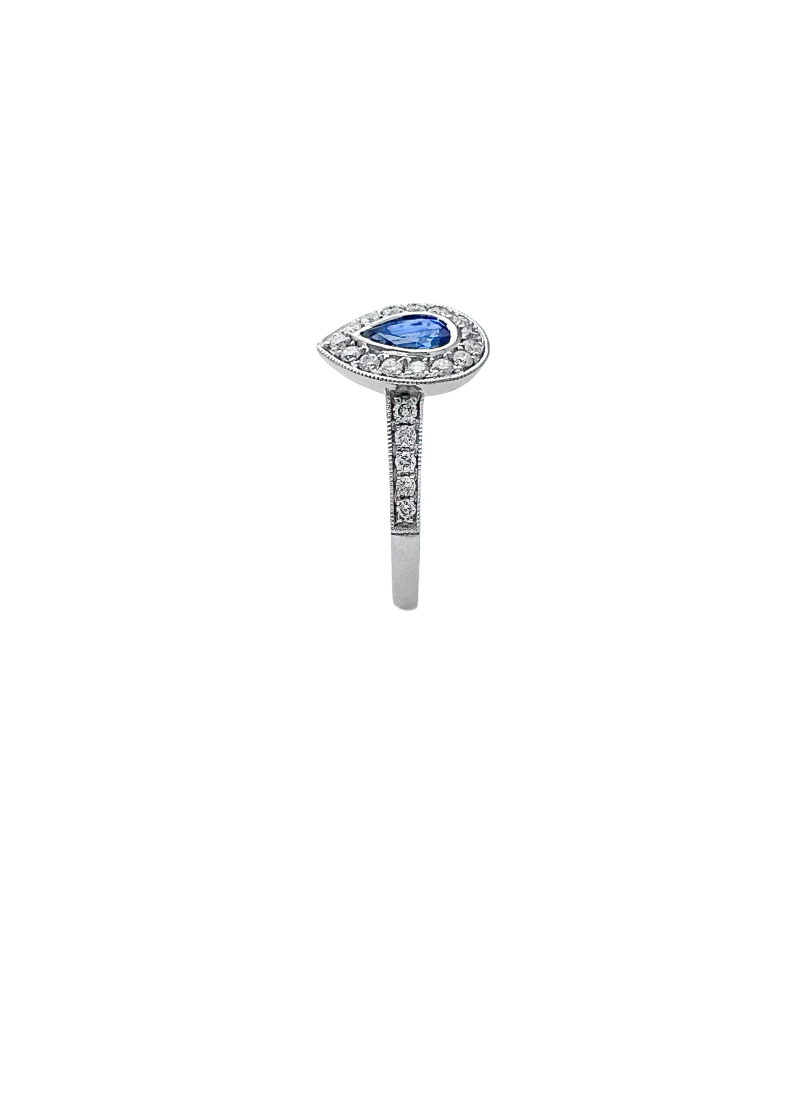 0.28 Carats Diamond VS2 & 0.44 Carats Blue Sapphire Set In 14 Karat White Gold Ring