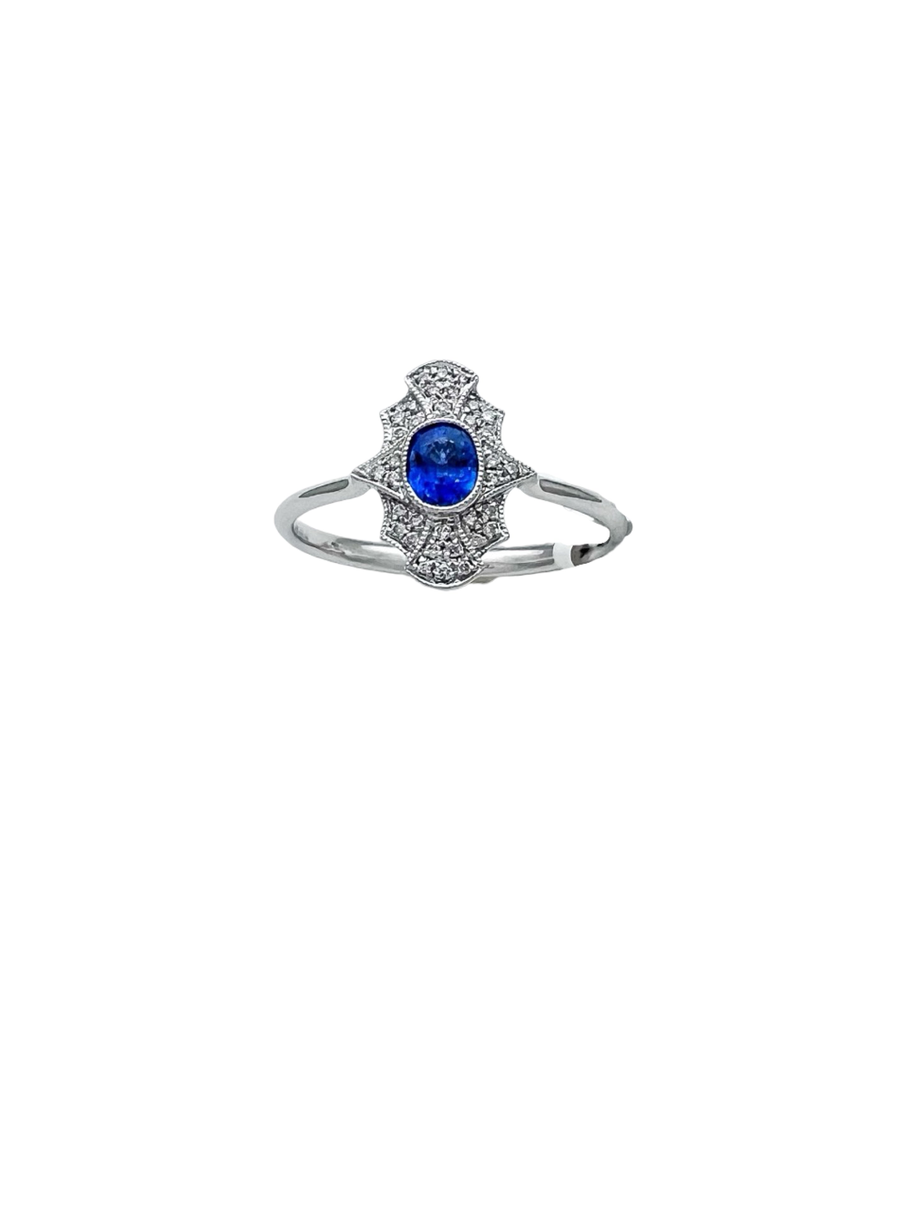 0.11 Carats Diamond VS2 & 0.57 Carats Blue Sapphire Set In 14 Karat White Gold Ring