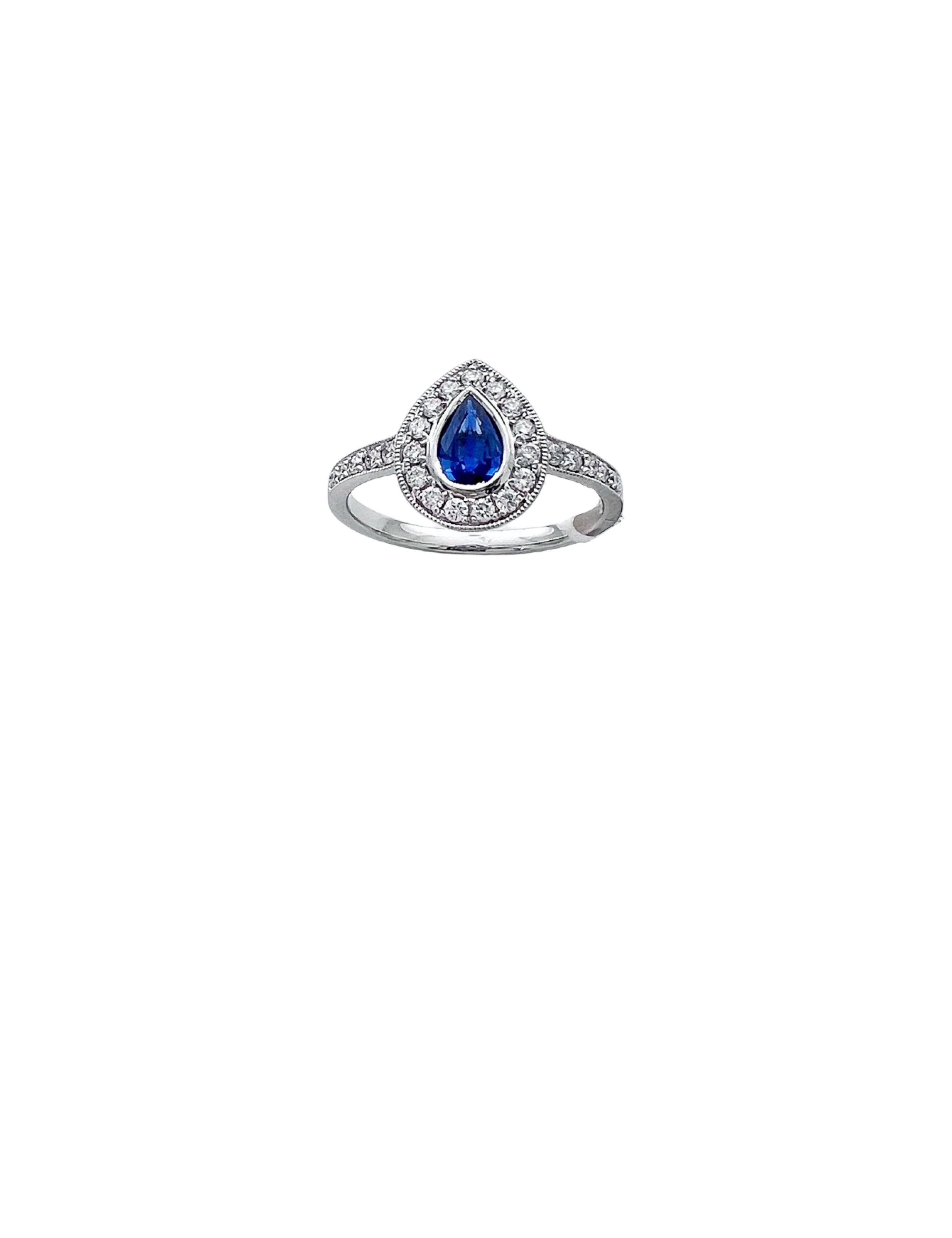 0.28 Carats Diamond VS2 & 0.44 Carats Blue Sapphire Set In 14 Karat White Gold Ring