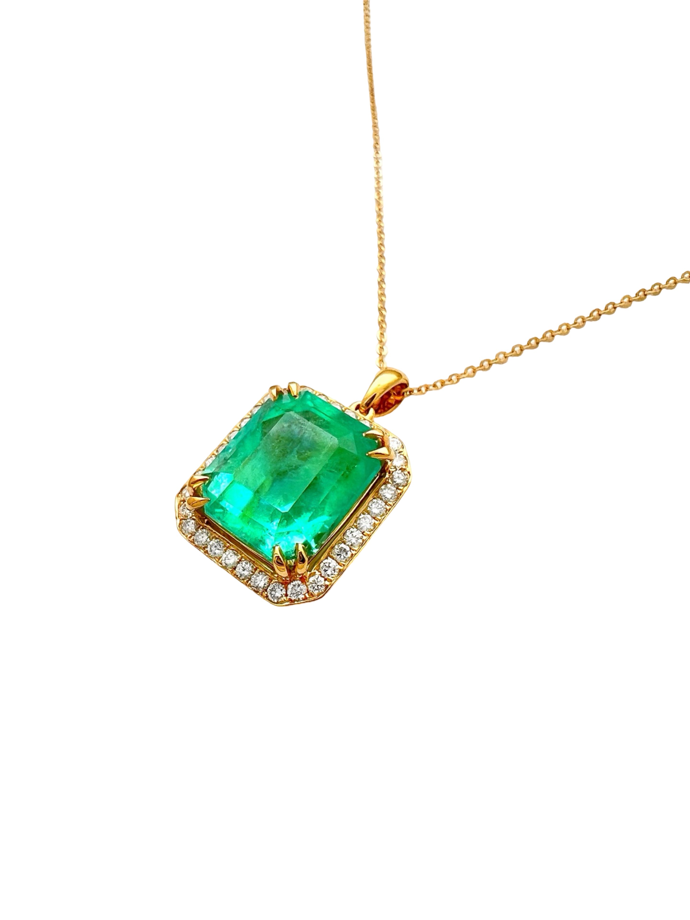 8.95 Carats Colombian Emerald F1 GIA (Certified) & 0.55 Carats Diamonds Set In 14 Karat Yellow Gold. Includes 14 Karat Dia-Cut Chain 18” Adjustable 16”