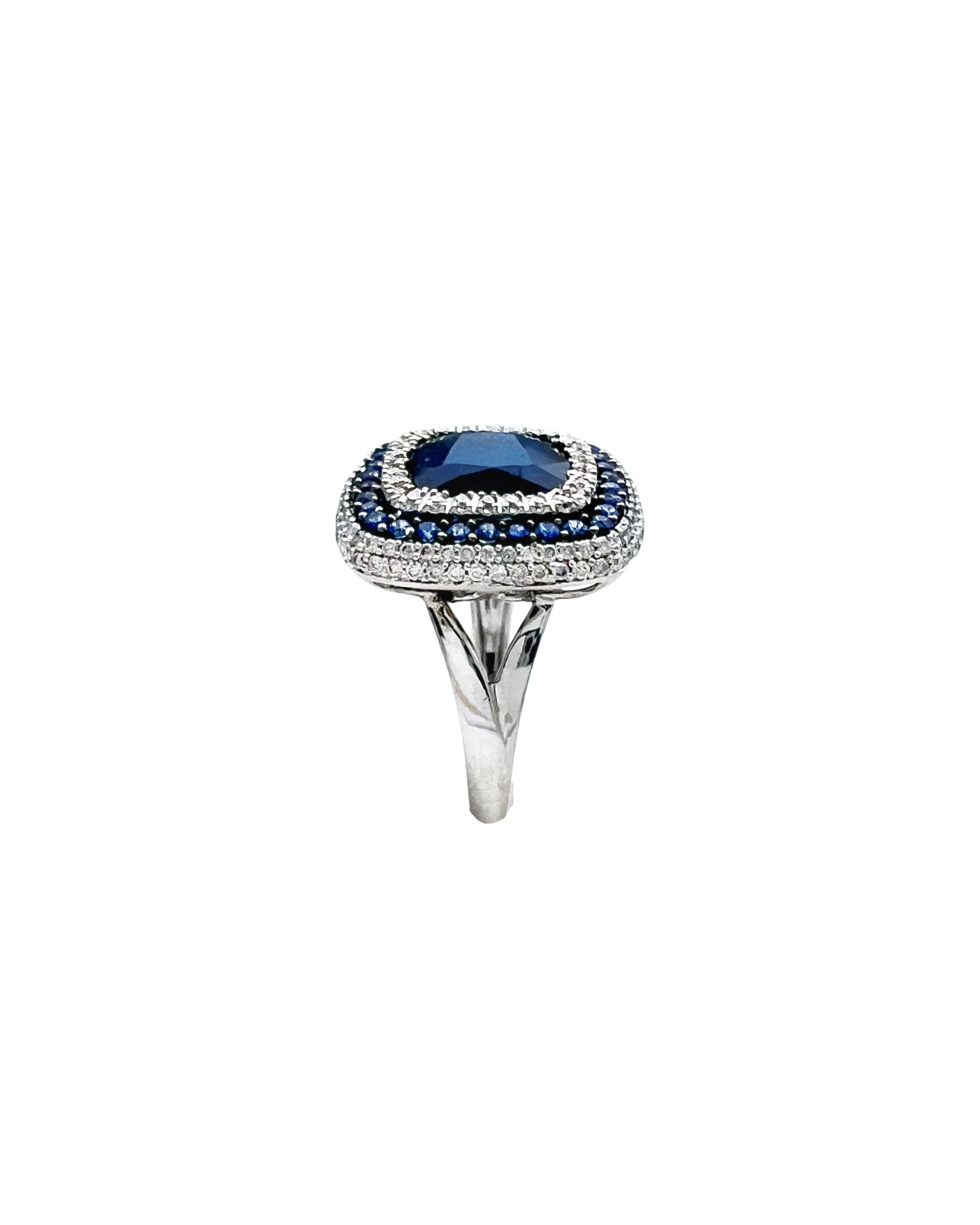 5.40 Carats Sapphire/Center 4.80 Sapphire Madagascar And 1.02 Carats Diamond VS2 Set 14 Karat White Gold Ring