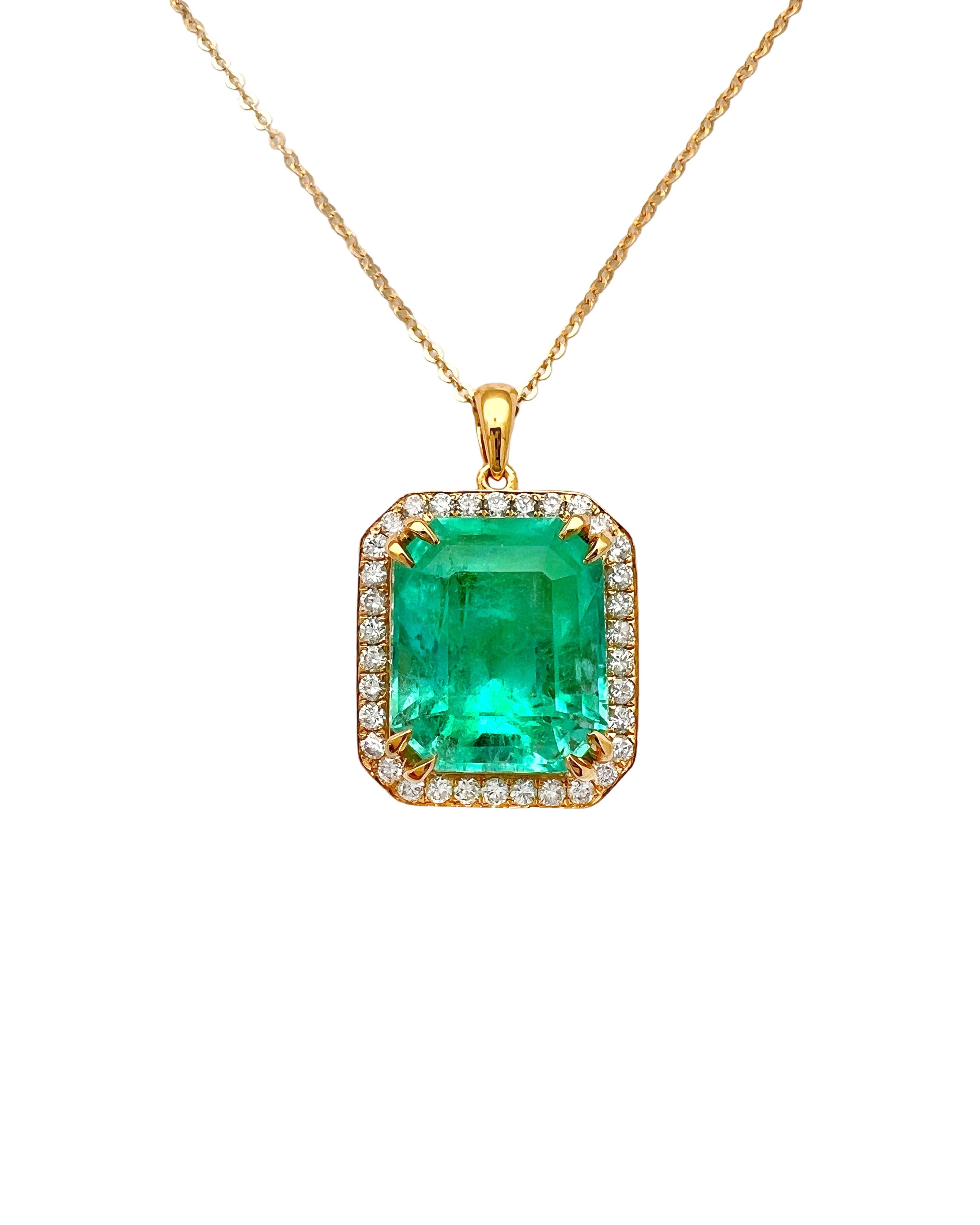 8.95 Carats Colombian Emerald F1 GIA (Certified) & 0.55 Carats Diamonds Set In 14 Karat Yellow Gold. Includes 14 Karat Dia-Cut Chain 18” Adjustable 16”