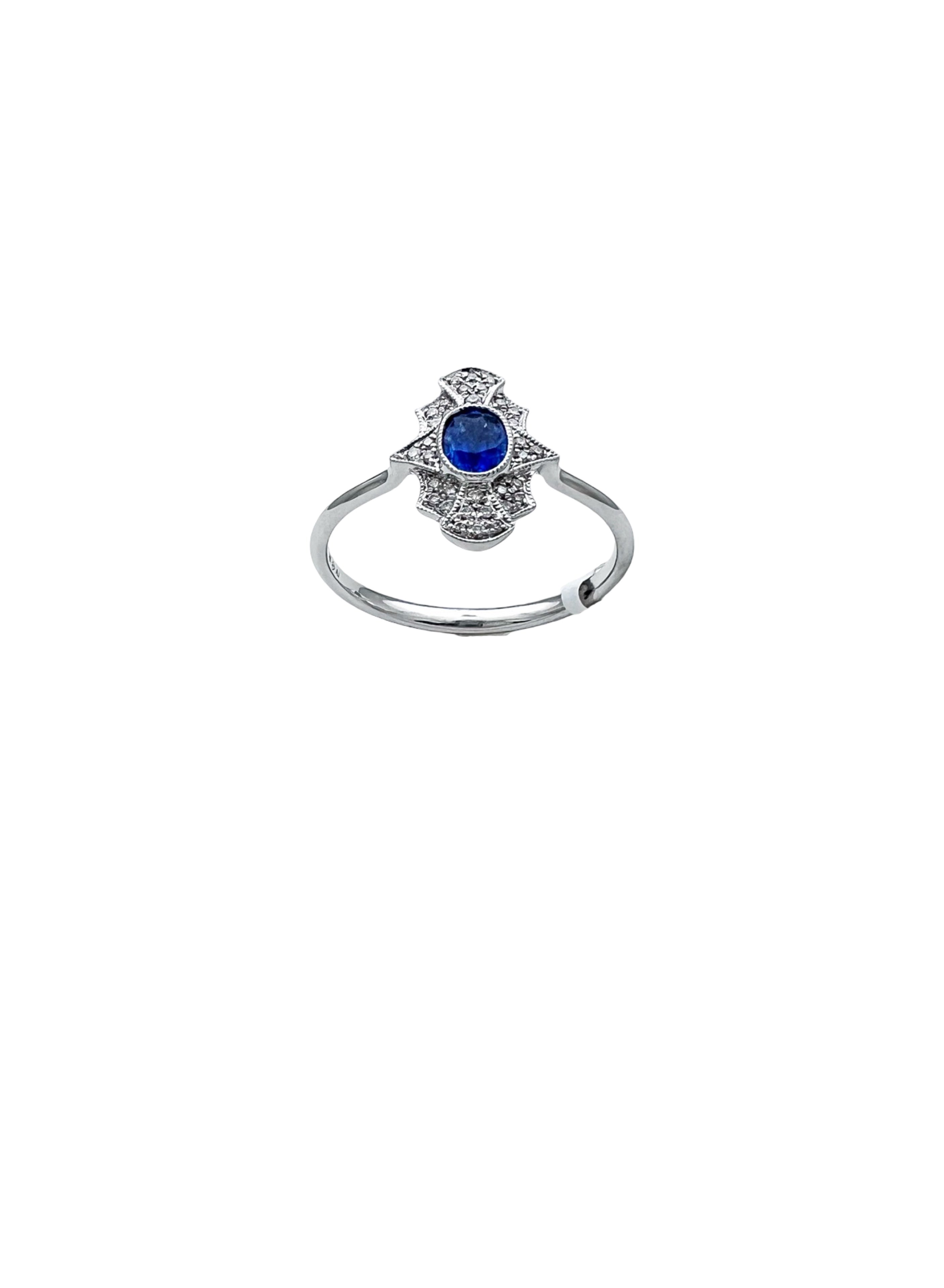 0.11 Carats Diamond VS2 & 0.57 Carats Blue Sapphire Set In 14 Karat White Gold Ring