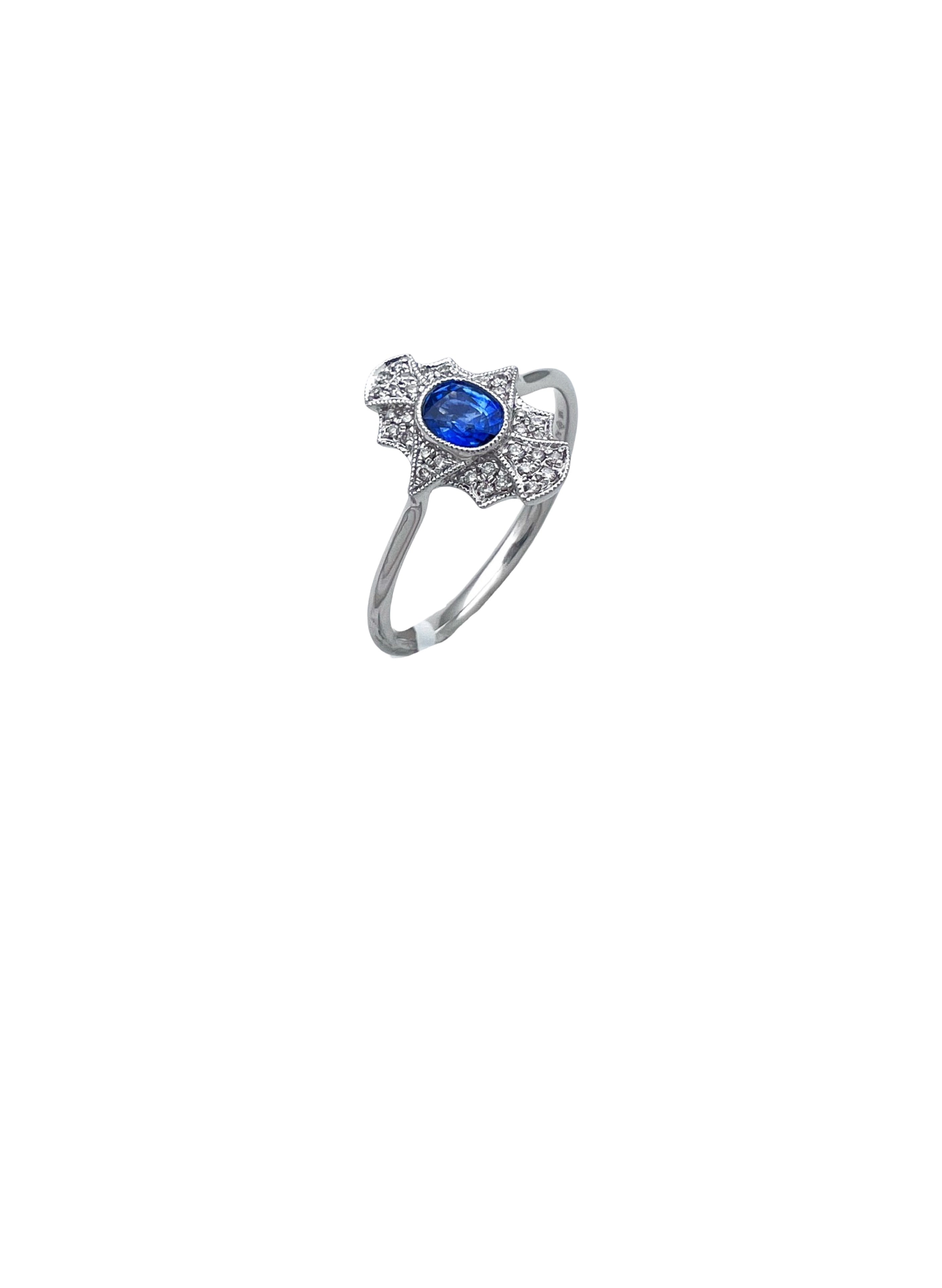 0.11 Carats Diamond VS2 & 0.57 Carats Blue Sapphire Set In 14 Karat White Gold Ring