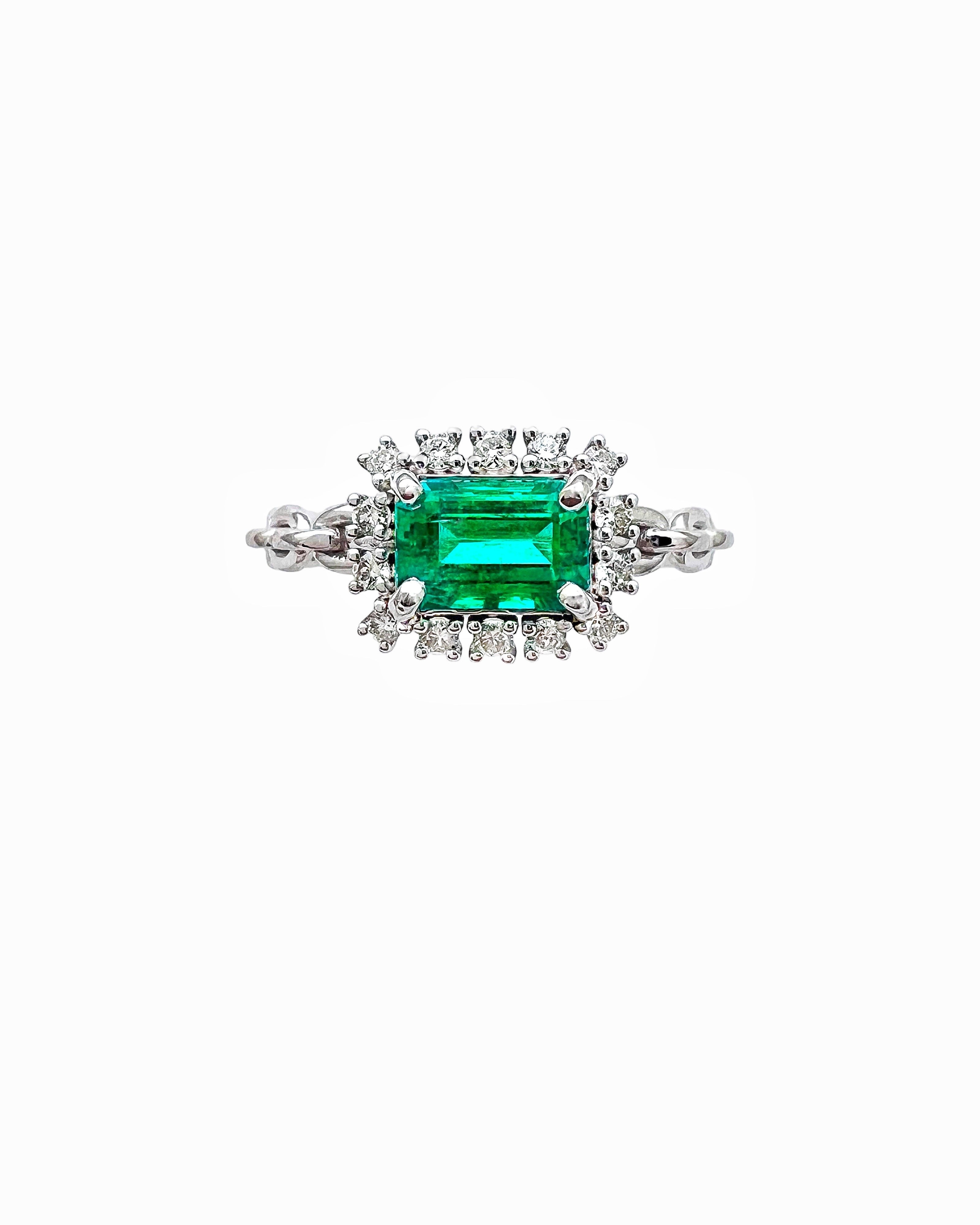 0.77 Carats Colombian Emerald F1 And 0.24 Carats Diamond VS2 Set 14 Karat White Gold Ring