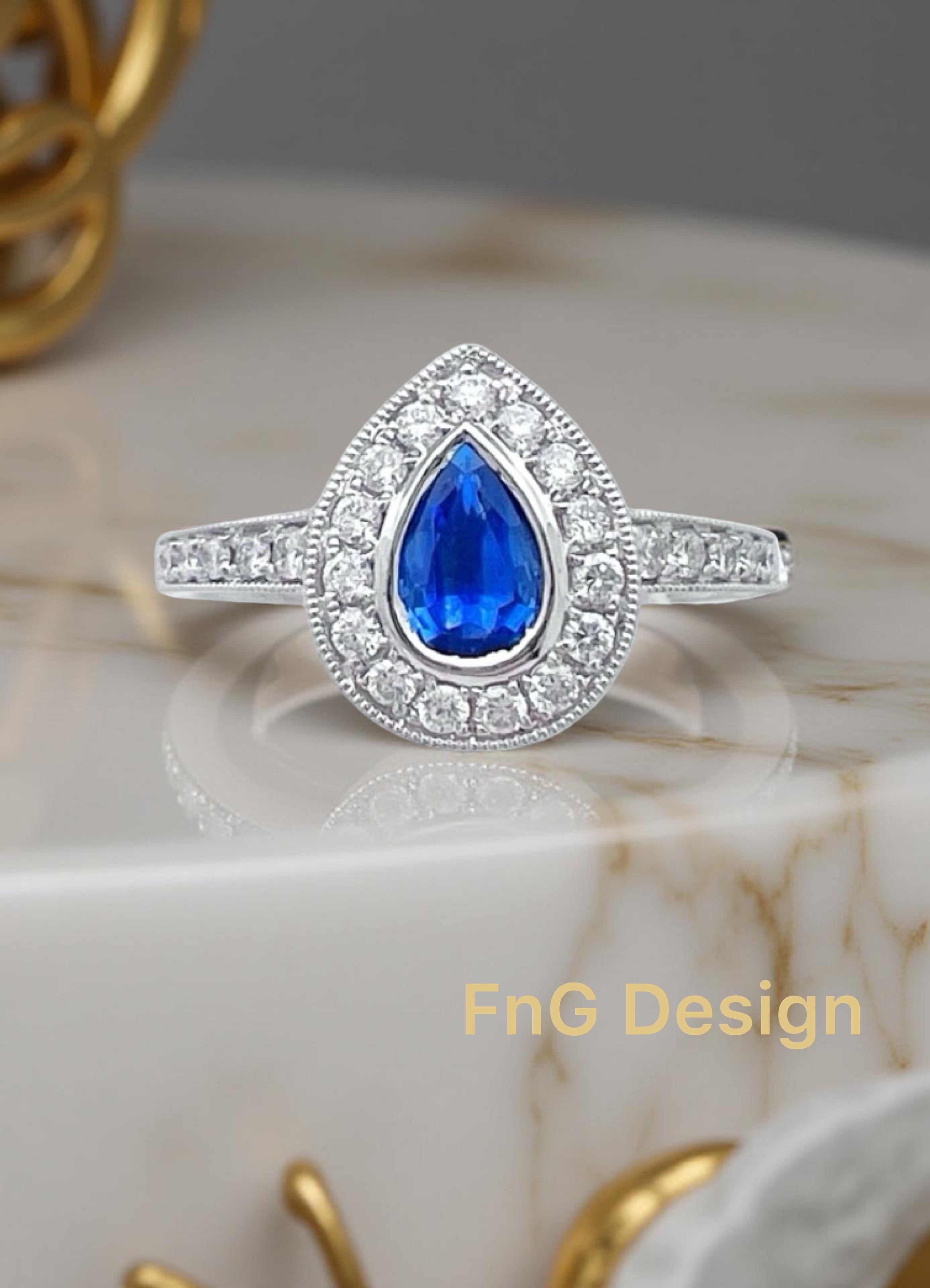 0.28 Carats Diamond VS2 & 0.44 Carats Blue Sapphire Set In 14 Karat White Gold Ring