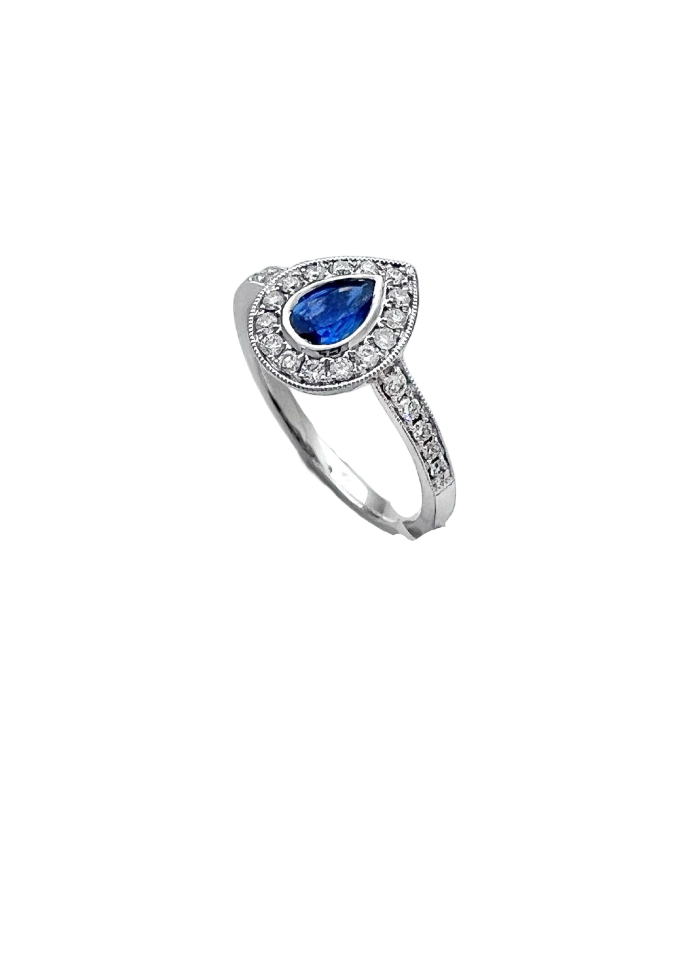 0.28 Carats Diamond VS2 & 0.44 Carats Blue Sapphire Set In 14 Karat White Gold Ring