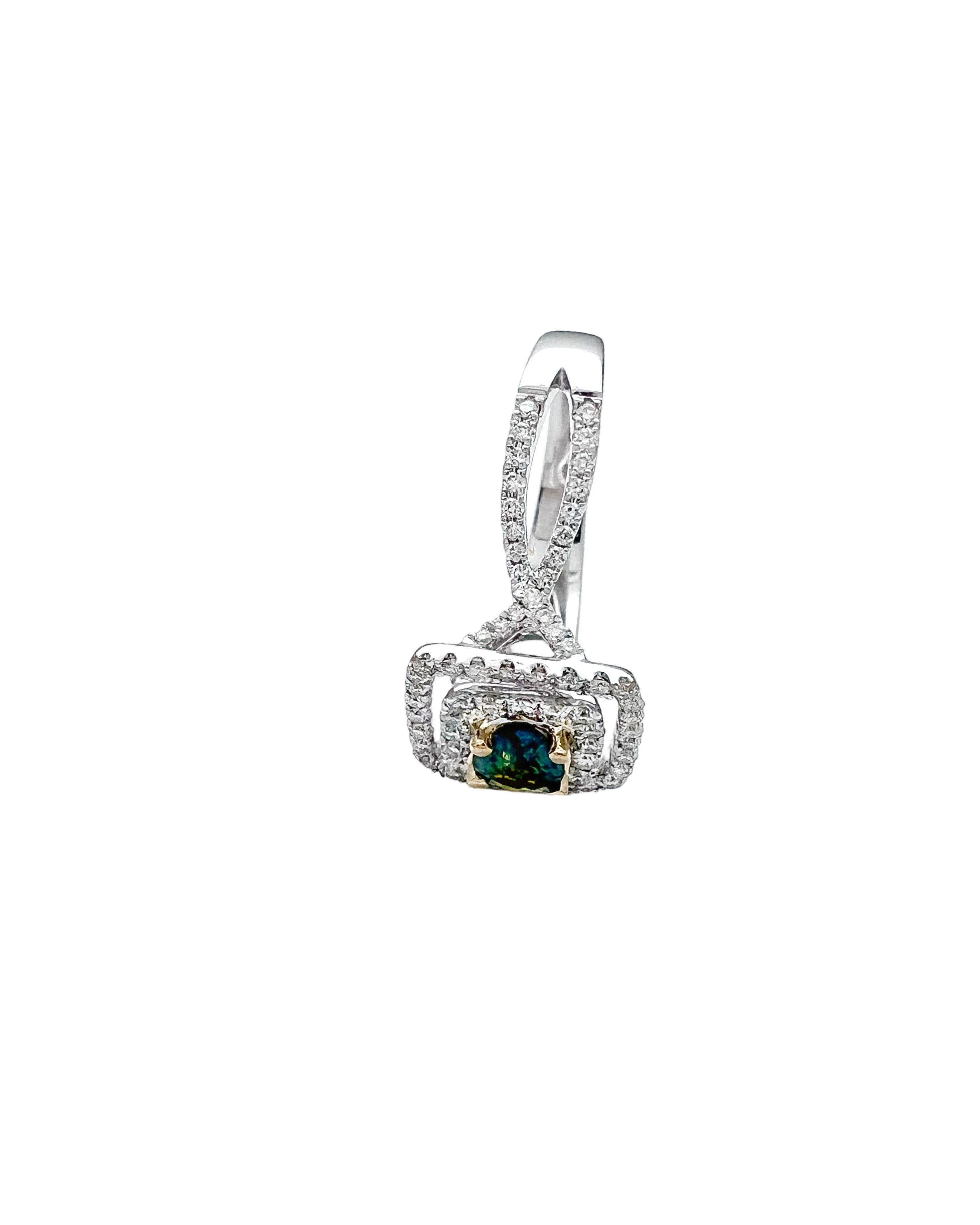 0.56 Carats Alexandrite GIA (Certified) & 0.92 Carats Diamonds VS2 Set In 18 Karat White-Yellow Gold Ring