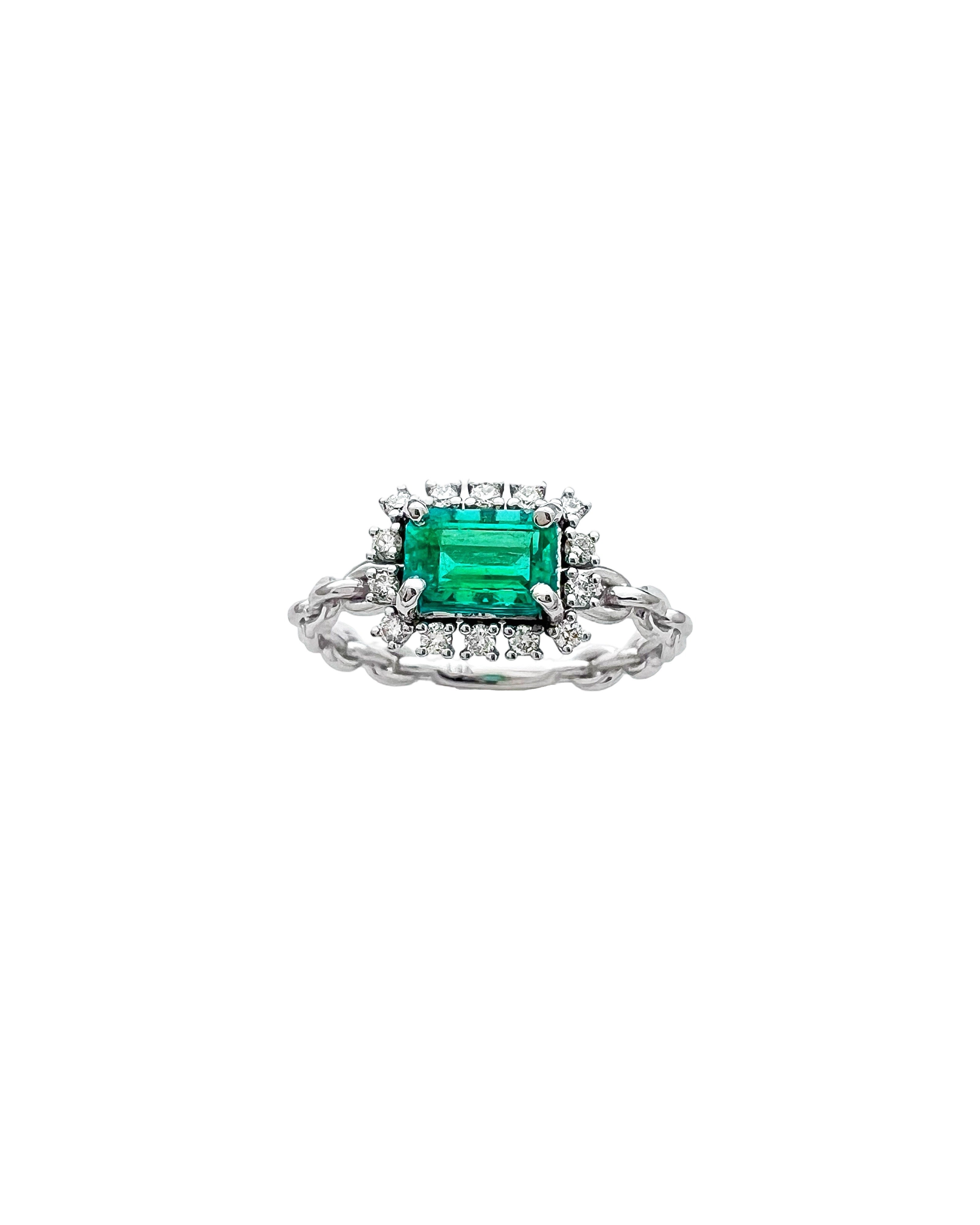 0.77 Carats Colombian Emerald F1 And 0.24 Carats Diamond VS2 Set 14 Karat White Gold Ring